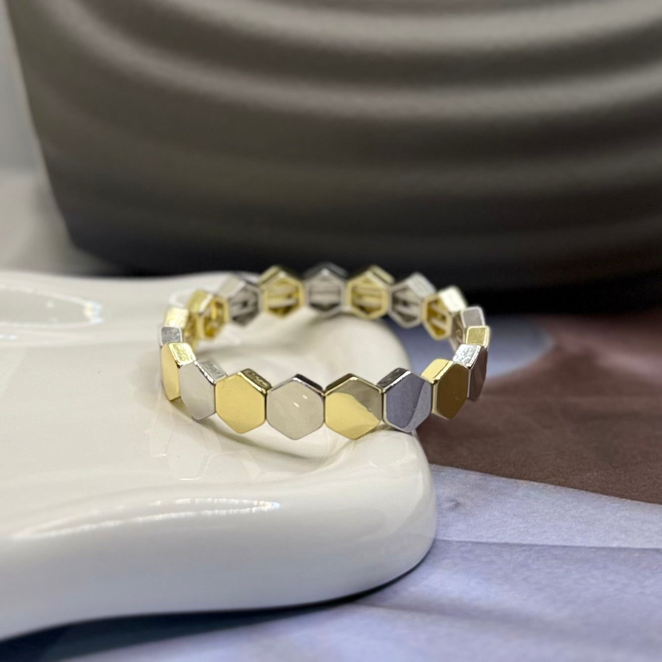 PULSERA RESORTE BICOLOR HEXÁGONO