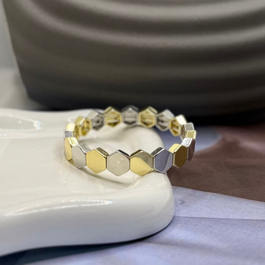 PULSERA RESORTE BICOLOR HEXÁGONO