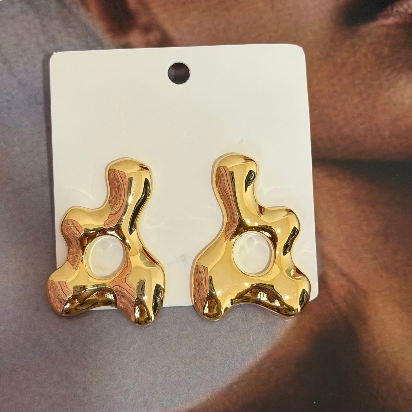 Arete asteric dorado