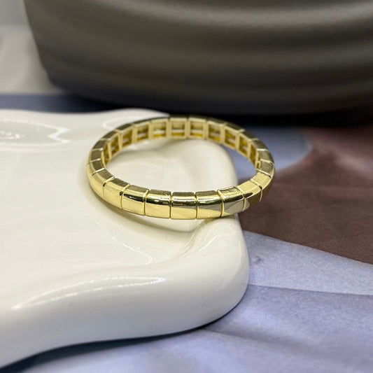 PULSERA RESORTE DORADO