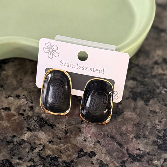 Arete oval piedra negra
