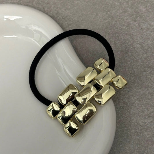 HAIRCUFF DORADO 045