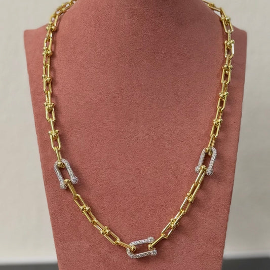 Cadena eslabones dorado con eslabón plateado con brillos