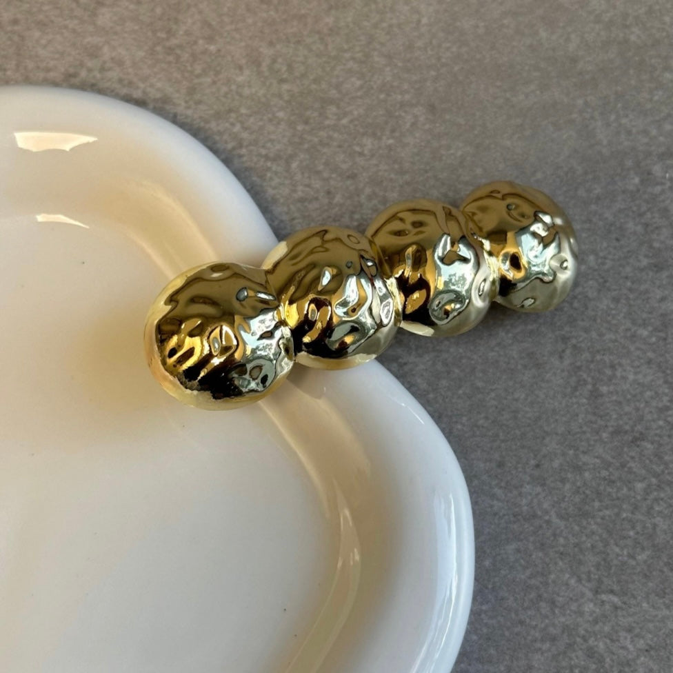 HAIRCUFF  BOLAS