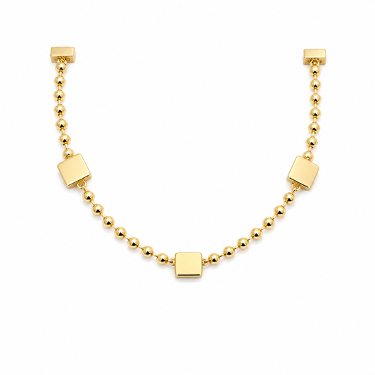 Collar dorado con bolitas y cuadros