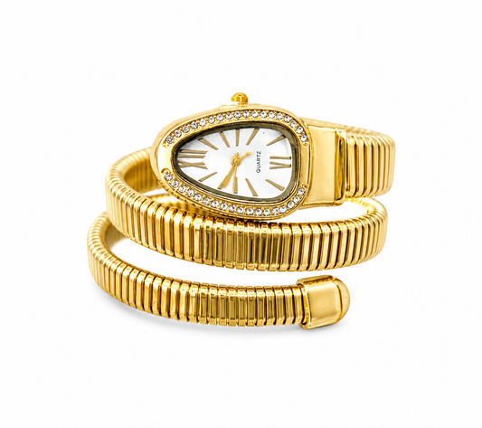 Reloj dorado tipo resorte